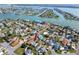 Waterfront community aerial showcasing the neighborhood's beautiful location near the water and surrounding residential properties at 13148 3Rd E St, Madeira Beach, FL 33708