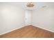 Cozy bedroom with modern lighting and wood-look laminate flooring at 13148 3Rd E St, Madeira Beach, FL 33708