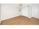 Clean bedroom with wood floors, a window, and a closet at 13148 3Rd E St, Madeira Beach, FL 33708