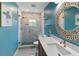 Bathroom featuring a vanity with vessel sink and tiled walk-in shower at 13501 Avista Dr, Tampa, FL 33624