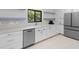 Kitchen with white cabinets, stainless steel appliances, and countertops at 13501 Avista Dr, Tampa, FL 33624