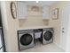Laundry room boasts modern appliances and ample counter space at 13501 Avista Dr, Tampa, FL 33624