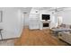 Bright living room featuring a fireplace, built-in shelving, and an open layout at 13501 Avista Dr, Tampa, FL 33624