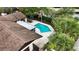 Relaxing backyard pool and patio area perfect for entertaining guests or enjoying time outdoors at 13501 Avista Dr, Tampa, FL 33624