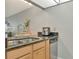 Kitchen showcasing stainless steel appliances, granite countertops, and ample cabinet space for storage at 14130 Rosemary Ln # 3202, Largo, FL 33774
