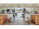 Inviting lobby with stylish furniture and a clear view of the pool, creating a welcoming atmosphere at 14130 Rosemary Ln # 3202, Largo, FL 33774