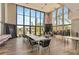 Spacious meeting room with large windows overlooking the lake provides abundant natural light at 14130 Rosemary Ln # 3202, Largo, FL 33774