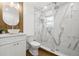 Modern bathroom features a glass shower, stylish vanity, and marble accents for a luxurious feel at 1650 22Nd N Ave, St Petersburg, FL 33713