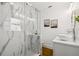 Modern bathroom featuring a glass shower, marble accents, and sleek fixtures for a spa-like experience at 1650 22Nd N Ave, St Petersburg, FL 33713