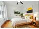 Inviting bedroom with hardwood floors, soft lighting, and stylish decor for a restful retreat at 1650 22Nd N Ave, St Petersburg, FL 33713