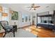 Cozy bedroom with hardwood floors, natural light, and a bunk bed, perfect for children or guests at 1650 22Nd N Ave, St Petersburg, FL 33713