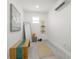 Bright gym area with natural light, bench, and wood laminate floors at 1650 22Nd N Ave, St Petersburg, FL 33713