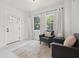 Bright, airy living room with neutral walls, modern furnishings, and a decorative rug at 1650 22Nd N Ave, St Petersburg, FL 33713