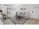 Inviting living space showcasing a cozy seating area and expansive windows at 1650 22Nd N Ave, St Petersburg, FL 33713