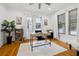 Bright home office with hardwood floors, a modern desk, and natural light for productivity at 1650 22Nd N Ave, St Petersburg, FL 33713