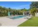 Sparkling pool with inviting lounge chairs, a grilling station, and a putting green at 1650 22Nd N Ave, St Petersburg, FL 33713