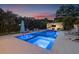 Sparkling pool and spa with an outdoor entertainment area, creating a perfect backyard oasis for relaxation and gatherings at 1650 22Nd N Ave, St Petersburg, FL 33713