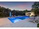 Sparkling pool and spa with an outdoor entertainment area, creating a perfect backyard oasis for relaxation and gatherings at 1650 22Nd N Ave, St Petersburg, FL 33713