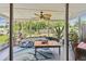 Enclosed patio with ceiling fan and plenty of natural light, creating a relaxing atmosphere at 1707 Cardinal Dr, Clearwater, FL 33759