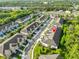 A high angle of several townhomes in a community setting with an identifier over the property at 17834 Althea Blue Pl, Lutz, FL 33558