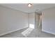 Bright bedroom with carpet, and natural light from a window at 17834 Althea Blue Pl, Lutz, FL 33558