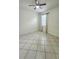 Bedroom with ceiling fan and window providing natural light at 221 Fairmont Dr, Spring Hill, FL 34609
