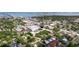Aerial view showcasing community and surrounding neighborhood with trees and a view of the water at 2525 W Bay Dr # B43, Belleair Bluffs, FL 33770