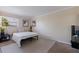 A minimalist bedroom with neutral walls, simple furnishings, and a serene atmosphere at 2525 W Bay Dr # B43, Belleair Bluffs, FL 33770