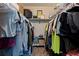 A well-organized walk-in closet offering ample storage space for clothing and accessories at 2525 W Bay Dr # B43, Belleair Bluffs, FL 33770