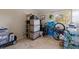 View of storage area with window featuring tile floors and storage items at 2525 W Bay Dr # B43, Belleair Bluffs, FL 33770