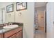 Bathroom featuring a sink with granite countertops with a tiled shower-tub combo in view at 26972 Evergreen Chase Dr, Wesley Chapel, FL 33544
