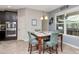 Kitchen with stainless steel appliances and plenty of cabinet space next to the dining room at 26972 Evergreen Chase Dr, Wesley Chapel, FL 33544