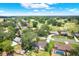 A beautiful neighborhood aerial view showcasing the lush landscaping, nearby golf course, and a serene suburban lifestyle at 2806 Fairway View Dr, Valrico, FL 33596