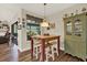 Eat-in kitchen with barstool seating, and bright interior at 2806 Fairway View Dr, Valrico, FL 33596