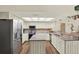 Kitchen featuring stainless steel appliances, granite countertops, and central island at 2806 Fairway View Dr, Valrico, FL 33596