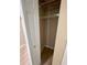Linen closet with laminate floor and wire shelving at 3007 Wainwright Ct, New Port Richey, FL 34655
