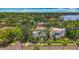 Stunning aerial view showcases the property's proximity to the water and lush landscaping at 301 23Rd Ne Ave, St Petersburg, FL 33704