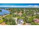 An aerial view of the neighborhood, showcasing mature greenery and views of the water at 301 23Rd Ne Ave, St Petersburg, FL 33704