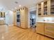 Open concept kitchen, hardwood floors and stainless steel appliances at 301 23Rd Ne Ave, St Petersburg, FL 33704