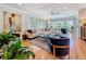 Beautiful living room offers hardwood floors, stylish seating, and ample natural light at 301 23Rd Ne Ave, St Petersburg, FL 33704