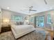 Spacious main bedroom featuring hardwood floors, neutral walls, and lots of natural light at 301 23Rd Ne Ave, St Petersburg, FL 33704