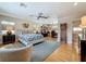 Spacious main bedroom boasts a sitting area, desk space, light hardwood floors, and recessed lighting at 301 23Rd Ne Ave, St Petersburg, FL 33704