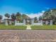 A picturesque view of the neighborhood featuring beautiful landscaping and charming architectural structures at 301 23Rd Ne Ave, St Petersburg, FL 33704