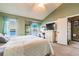 Main bedroom with ample natural light, walk in closet, and views to the water at 3127 W Sligh Ave # 303B, Tampa, FL 33614
