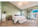 Bright primary bedroom with ample natural light, neutral paint, and water views at 3127 W Sligh Ave # 303B, Tampa, FL 33614