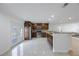 Bright kitchen with stainless steel appliances, granite countertops, and tile flooring at 3301 Tuckahoe Pl, Holiday, FL 34690