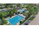 Resort-style Primary planned community featuring both leisure and lap pools and lush landscaping for recreation and relaxation at 33075 Kateland Dr, Wesley Chapel, FL 33545