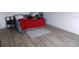 Bedroom featuring a daybed, wood-look flooring, and ample natural light at 3512 Osprey Cove Dr, Riverview, FL 33578