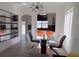 Modern dining room with contemporary lighting, stainless steel accents, and kitchen access at 3512 Osprey Cove Dr, Riverview, FL 33578