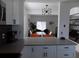 Open kitchen and dining area with stainless steel appliances and a modern design at 3512 Osprey Cove Dr, Riverview, FL 33578